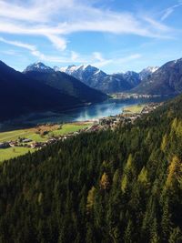 Scenic view of landscape and mountains against sky