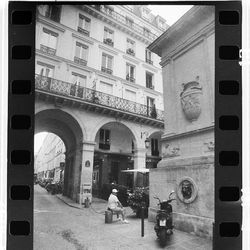 Woman standing in front of building