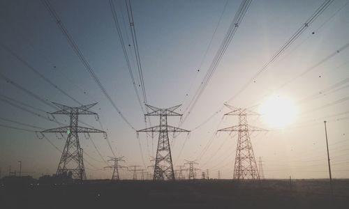 Electricity pylon at sunset