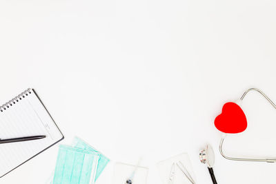 Close-up of heart shape over white background