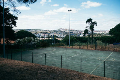 Scenic view of soccer field against sky