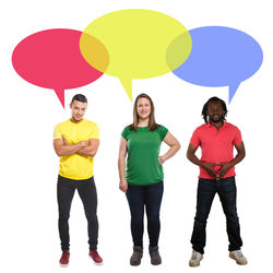 Portrait of young couple standing against white background