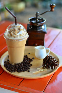 Close-up of coffee cup on table