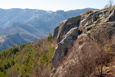 Scenic view of rocky mountains against sky