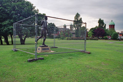 Playground in park against sky