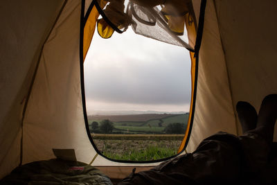 Landscape against sky seen from tent