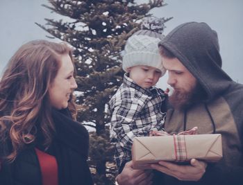 Cheerful family outdoors during winter