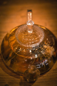 Close-up of wine glasses on table