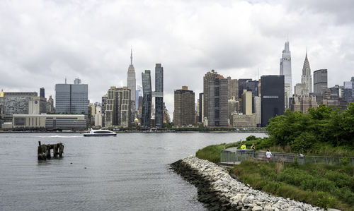 View of city against cloudy sky