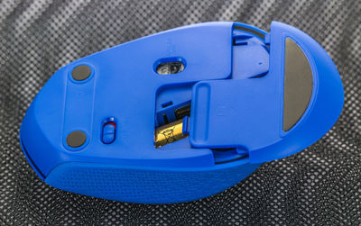 High angle view of blue wireless mouse