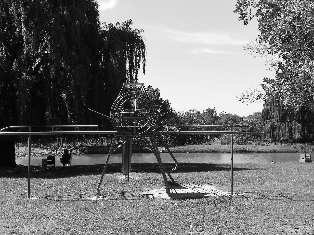 VIEW OF PARK AGAINST SKY IN PLAYGROUND