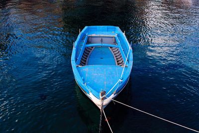 High angle view of boat moored in lake