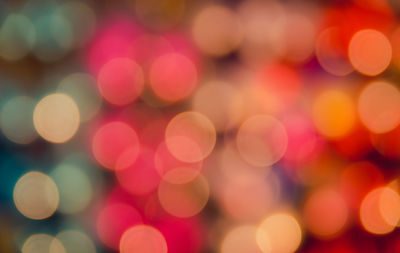 Defocused image of colorful illuminated lights at night