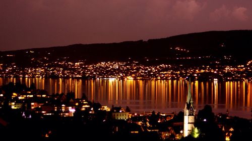 Illuminated cityscape at night