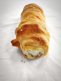 Close-up of bread on white background