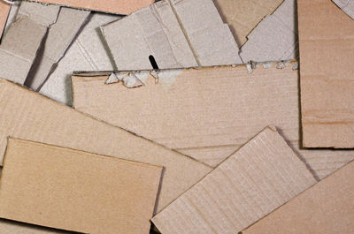 High angle view of papers in box