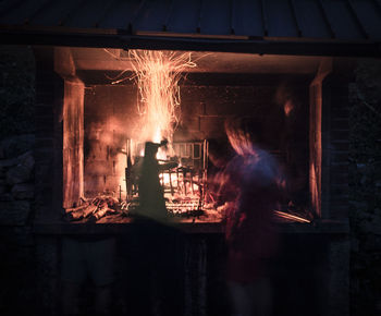 View of illuminated bonfire at night