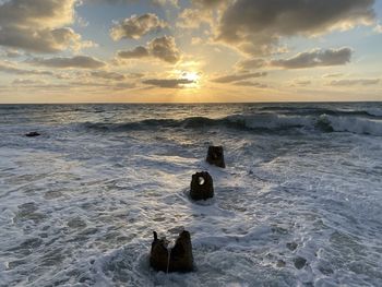 Scenic view of sea against sky during sunset