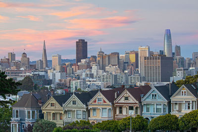 Buildings in city against sky