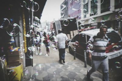 People walking on city street