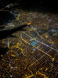 High angle view of illuminated cityscape at night