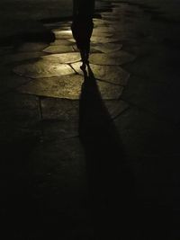 Shadow of people in dark room