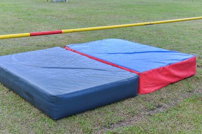 High angle view of umbrella on grassy field