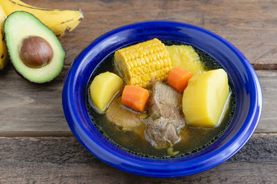 High angle view of fruits in plate on table