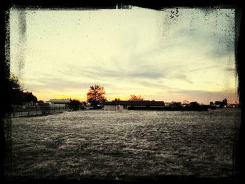 Scenic view of cloudy sky at sunset