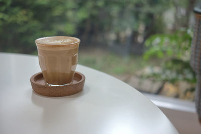 Close-up of coffee cup on table