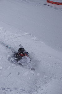 High angle view of person on snow covered field