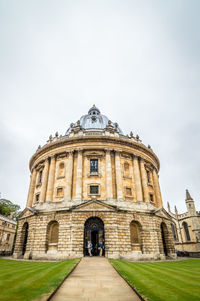 Low angle view of radcliffe camera against sky