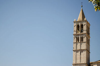 Low angle view of clock tower against sky