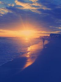 Scenic view of sea at sunset