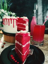 Close-up of red cake on table