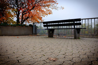 Empty park against sky during autumn