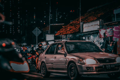 Vehicles on road at night