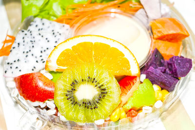 Close-up of fruits in plate