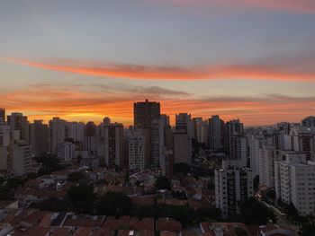 Cityscape against sky during sunset