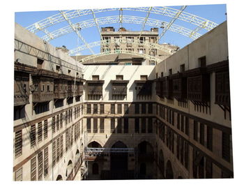 Buildings in city against sky