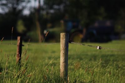 Wooden fence on field