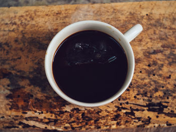 High angle view of coffee cup on table