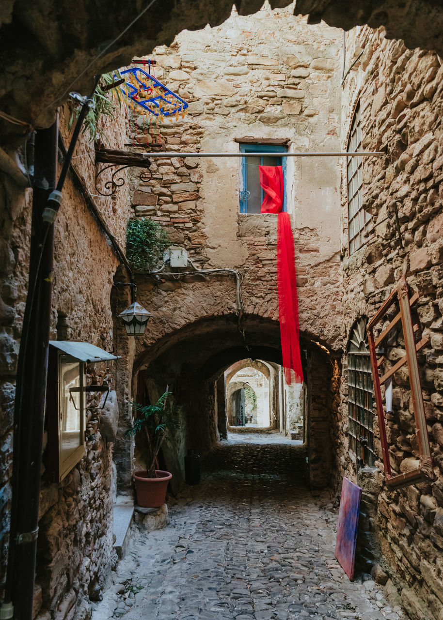 ALLEY AMIDST BUILDINGS