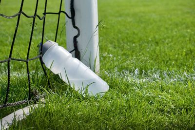 Close-up of white ball on field