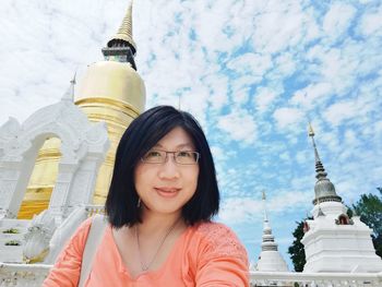 Portrait of young woman in temple