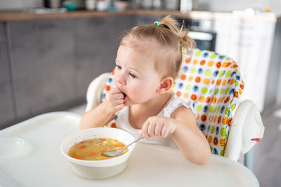 Close-up of boy eating food