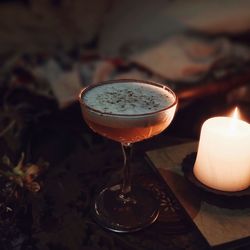 High angle view of tea light candle on table