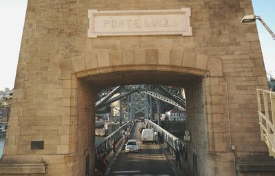 Low angle view of bridge in city