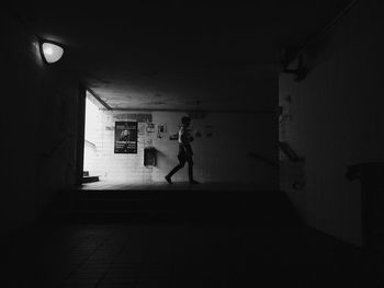 Man standing in corridor