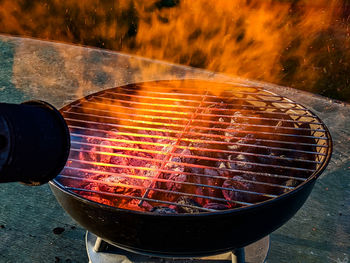 High angle view of meat on barbecue grill